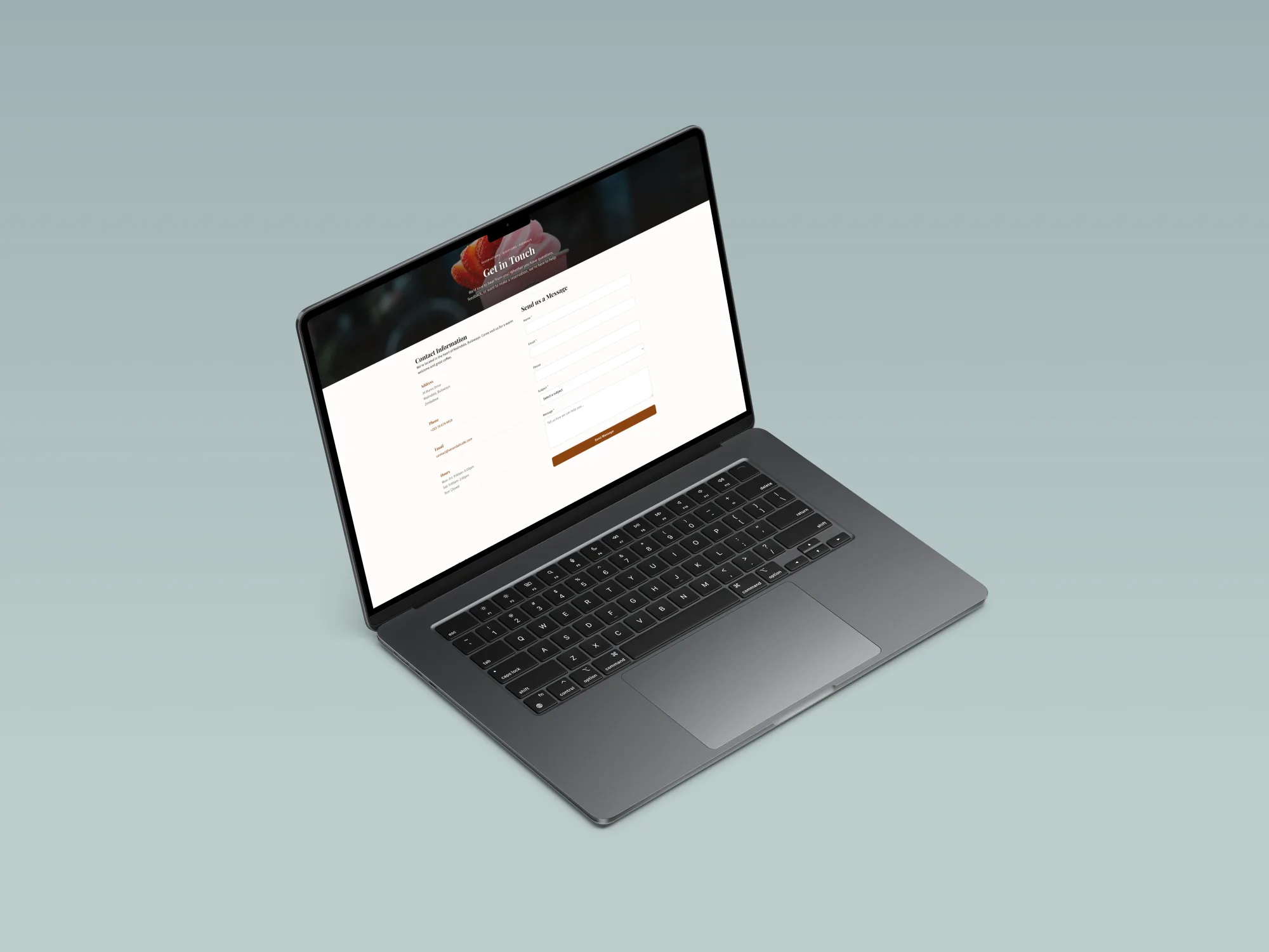 Verandah Café Contact page on a laptop mockup